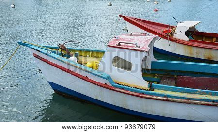 Weathered Fishing Boats in Caribbean Port