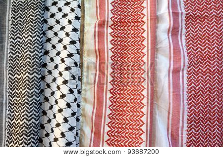 Traditional Middle Eastern headdress fashioned square scarf Keffiye background texture.