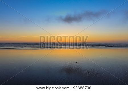 Mirrorlike Beach At Sunset.