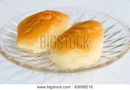 freshly baked soft bun on white background