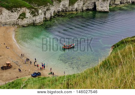 A view of the beach and surrounding rock at the North Landing at Flamborough Head on the north Yorkshire coast.