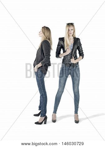 two young blonde attractive fashion model posing with trendy style in studio