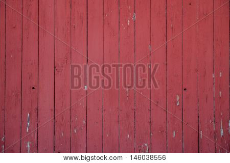 close up of the side of a red barn