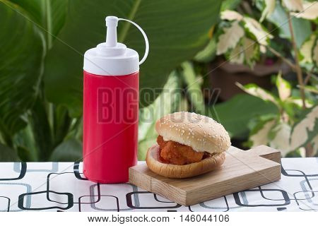 Spicy Chicken Burger on the wooden plate