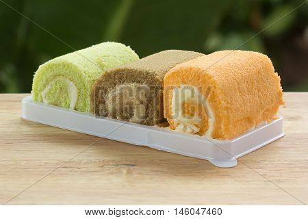 Three flavors jam rool cake on the tray