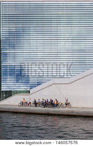 Group Of Young Tourists On A Bike Tour In Berlin