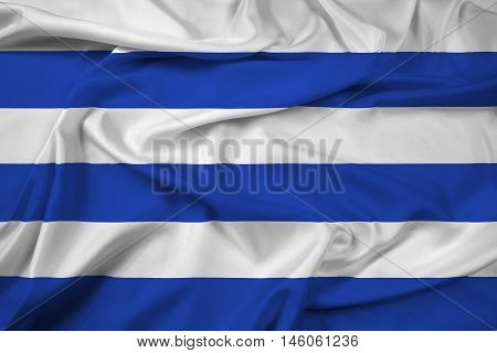 Waving Flag of Dunkirk France, with beautiful satin background. 3D illustration