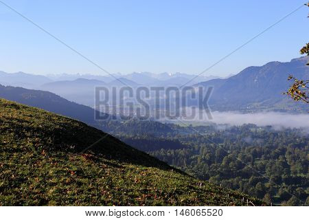 autumn landscape with mountains and fields in bavaria