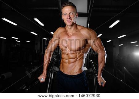 Strong Athletic Man Fitness Model Showing Six Pack Abs