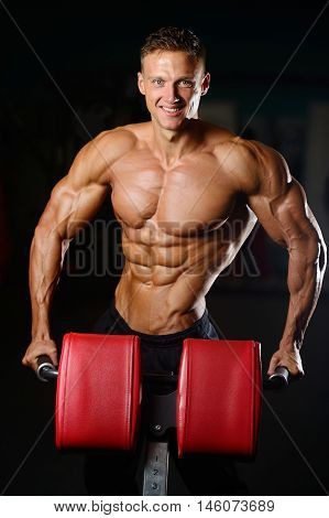 Strong Athletic Man Fitness Model Showing Six Pack Abs