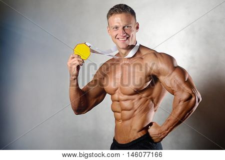 Fitness strength training workout bodybuilding concept background - muscular bodybuilder man doing exercises in gym