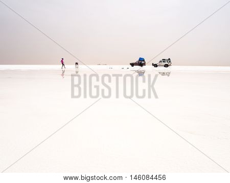 AFAR REGION ETHIOPIA - JUNE 26 2016: Tourists visiting salt desert and lake in the Afar Region Ethiopia.