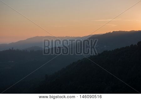 scenic view of sunset mountains at Peneda Geres National Park in northern Portugal.