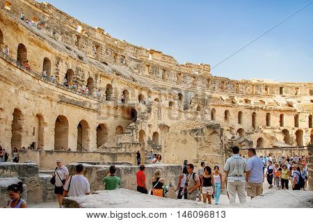 MAHDIA TUNISIA - September 03 2007. Tourists in ruins of El Djem amphitheatre the most impressive Roman remains in Africa. UNESCO World Heritage Site.