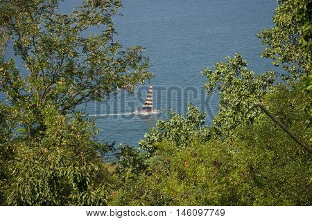 Gabicce Mare (RN) Italy - August 29 2016: Tourist boat sailing on the Adriatic Coast in summer