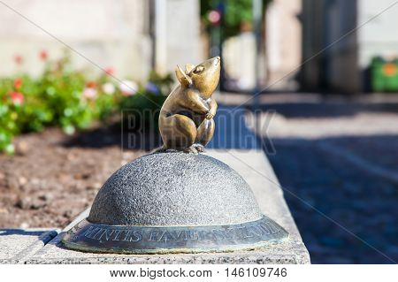 LITHUANIA KLAIPEDA - JULY 20 2016: Sculpture of nice little mouse in oldtown Klaipeda. Lithuania.