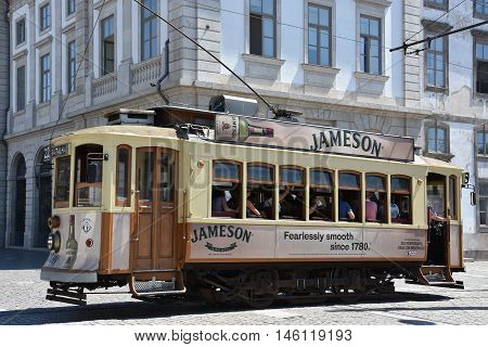 PORTO, PORTUGAL - AUG 22: Tram in Porto, Portugal, as seen on Aug 22, 2016. Porto has three regular heritage tram routes and they all use vintage tramcars exclusively.