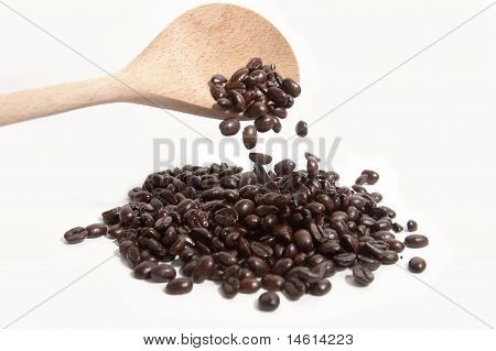 Wooden Spoon Dropping Coffee Beans