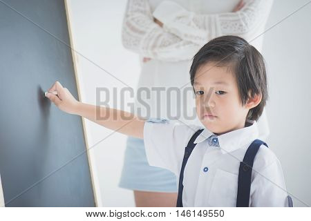 Tired Asian student doesn't want to learn