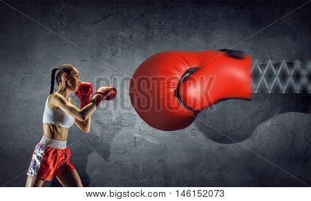 She is determined to fight . Mixed media