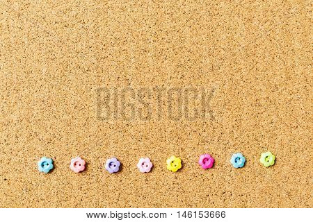For beautiful background with cork board texture color buttons
