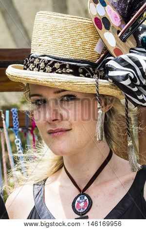 CAGLIARI, ITALY - June 1, 2014: Sunday at La Grande Jatte public gardens - Sardinia - portrait of a beautiful woman in Victorian costumes