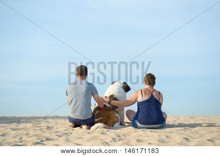 Owners With Their Dog