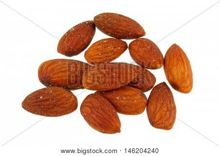Roasted salted Almond nuts with salt isolated on white background.
