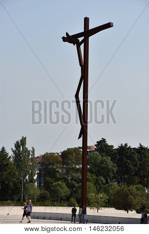FATIMA, PORTUGAL - AUG 24: Sanctuary of Fatima in Portugal, as seen on Aug 24, 2016. It consists of a tall centralized bell-tower and nave, 213 ft in height, decorated by a 15,000 lb crown of bronze.
