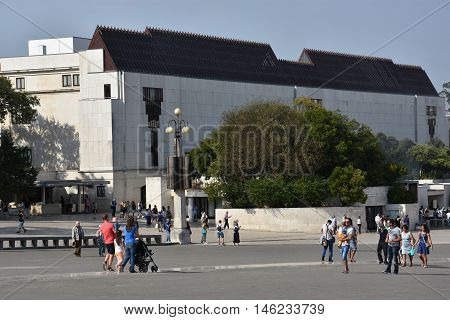 FATIMA, PORTUGAL - AUG 24: Sanctuary of Fatima in Portugal, as seen on Aug 24, 2016. It consists of a tall centralized bell-tower and nave, 213 ft in height, decorated by a 15,000 lb crown of bronze.