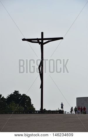 FATIMA, PORTUGAL - AUG 24: Sanctuary of Fatima in Portugal, as seen on Aug 24, 2016. It consists of a tall centralized bell-tower and nave, 213 ft in height, decorated by a 15,000 lb crown of bronze.