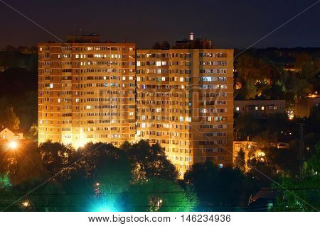 View on cozy district of Tula with street lights in summer evening Russia.