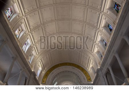 FATIMA, PORTUGAL - AUG 24: Sanctuary of Fatima in Portugal, as seen on Aug 24, 2016. It consists of a tall centralized bell-tower and nave, 213 ft in height, decorated by a 15,000 lb crown of bronze.