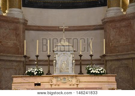 FATIMA, PORTUGAL - AUG 24: Sanctuary of Fatima in Portugal, as seen on Aug 24, 2016. It consists of a tall centralized bell-tower and nave, 213 ft in height, decorated by a 15,000 lb crown of bronze.