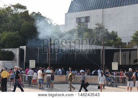 FATIMA, PORTUGAL - AUG 24: Sanctuary of Fatima in Portugal, as seen on Aug 24, 2016. It consists of a tall centralized bell-tower and nave, 213 ft in height, decorated by a 15,000 lb crown of bronze.