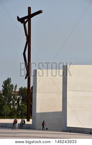 FATIMA, PORTUGAL - AUG 24: Sanctuary of Fatima in Portugal, as seen on Aug 24, 2016. It consists of a tall centralized bell-tower and nave, 213 ft in height, decorated by a 15,000 lb crown of bronze.