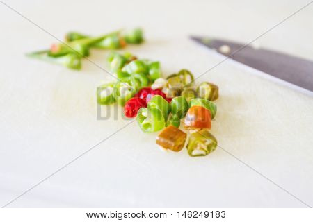 Focus Selec middle Hot chilli , sliced on a cutting board