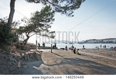 Beach People And Parasols Silhouettes