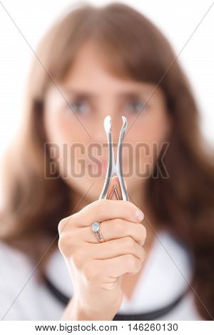 Female Ent Doctor Holding A Tool