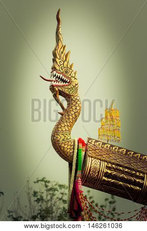 Head of naka statue on Thai style Rocket Boon Bang Fai festival Thailand vignetting