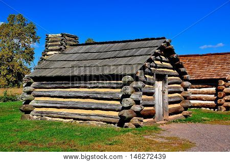 Valley Forge Pennsylvania - October 15 2015: Wooden log cabins housed Continental Army soldiers during the 1787-88 Revolutionary War winter encampment at Valley Forge *