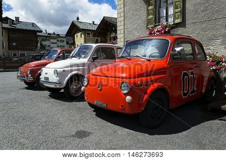 Livigno, Italy - August 1: Three Vintage Fiat 500 Cars Stand On Street On 1 August 2016 In Livigno,