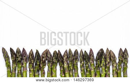 Delicious fresh green asparagus on white background
