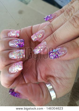 Close up of stylish hand painted glittery pink