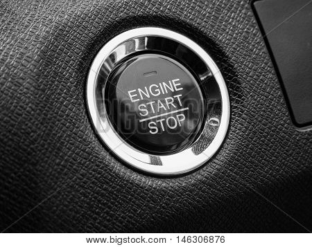 Start/stop engine car button red interior black press by hand to drive