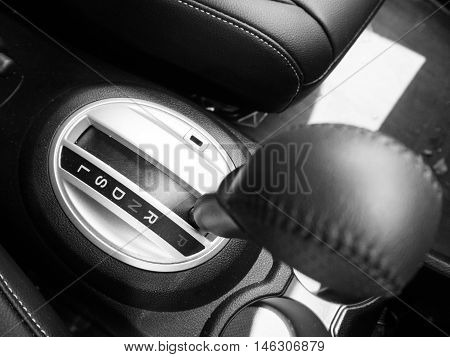 Soft focus at automatic gear shifts left in car
