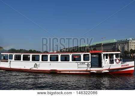 HAMBURG, GERMANY - AUG 26: Boats on Lake Alster in Hamburg, Germany, as seen on Aug 26, 2016. Hamburg was founded at the mouth of Alster river in the 9th century and has been used as a port since.
