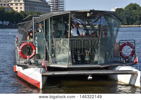 HAMBURG, GERMANY - AUG 26: Boats on Lake Alster in Hamburg, Germany, as seen on Aug 26, 2016. Hamburg was founded at the mouth of Alster river in the 9th century and has been used as a port since.