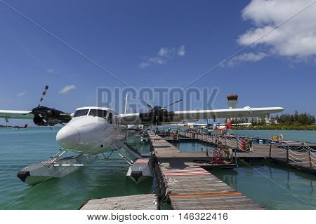 Male Maldives - June 14 2015 : Seaplane harbor of any Maldivian airways operating out of Ibrahim Nasir airport in Male Maldives provides services to several island resorts