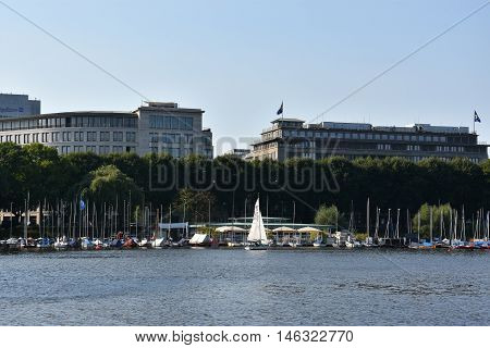 HAMBURG, GERMANY - AUG 26: Sailboats on Lake Alster in Hamburg, Germany, as seen on Aug 26, 2016. Hamburg was founded at the mouth of Alster river in the 9th century and has been used as a port since.